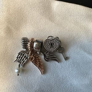 Lot of 4 Pandora charms authentic, material: silver